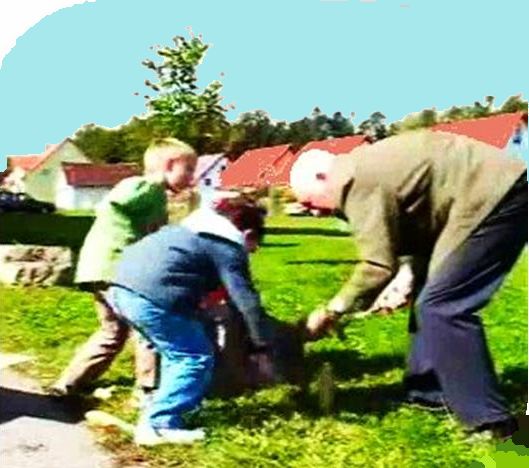 boys working enthusiastically with grandpa