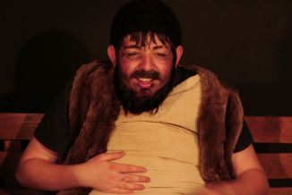 language-theatre youngster with fat costume 