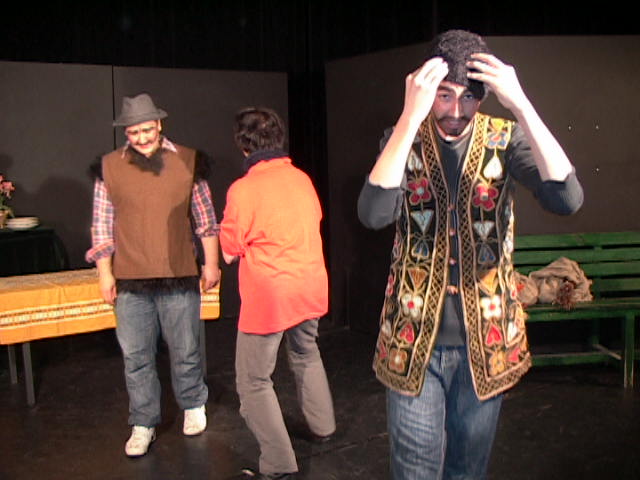 language-theatre actor holding hands on his head