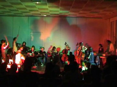 music as a sport orphanage children playing coloured light performance