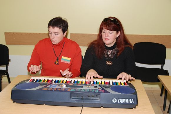 music as a sport keyboard with coloured keys adults group course