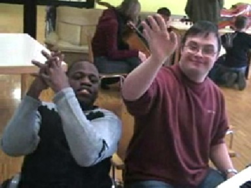 music as a sport neurodidactic inclusion handicaped people happy, clapping hands