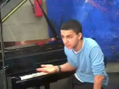 music as a sport neurodidactic brain-based migrant youngster explaining at the grand-piano